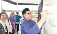  ??  ?? SADDI merasmikan Jeti 1Malaysia di Tundun Buhangin.