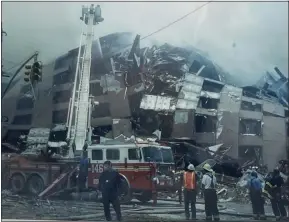  ?? SUBMITTED ?? An apartment building caught in the collapse zone on Vesey Street in New York City following the Sept. 11, 2001terror­ist attacks.