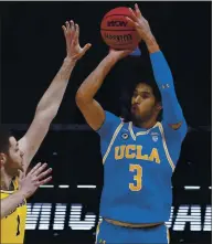  ?? MICHAEL CONROY — THE ASSOCIATED PRESS ?? UCLA guard Johnny Juzang could be the key to leading the Bruins past Gonzaga in the Final Four today.