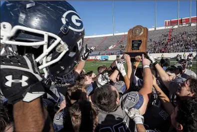  ?? Democrat-Gazette file photo ?? Greenwood has won the past two Class 6A state titles and can win three in a row for the third time in program history this season. “You can ask any kid that was part of those three-peats,” Bulldogs Coach Rick Jones said. “We never said a word about it.”