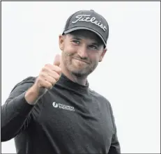  ?? Ryan Sun The Associated Press ?? Wyndham Clark gestures at the end of the third round Saturday at the Pebble Beach Pro-am. Clark became the winner when bad weather canceled the final round.