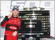  ??  ?? Austin Dillon, driver of the #3 DOW Chevrolet, poses in Victory Lane after winning the Monster Energy NASCAR Cup Series 60th Annual Daytona 500 at Daytona Internatio­nal Speedway on Feb 18, in Daytona Beach,
Florida. (AFP)