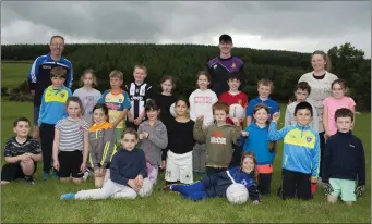  ??  ?? Lacken-Kilbride’s under-9s with Donal Gahan, James Grace and Sinead Eustace.