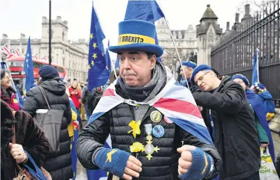  ?? PHOTO: GETTY IMAGES ?? A losing battle . . . AntiBrexit campaigner Steve Bray protests outside the Houses of Parliament in London yesterday. At 11am today the United Kingdom and Northern Ireland will exit the European Union, 188 weeks after the referendum of June 23, 2016.