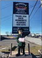  ?? SUBMITTED PHOTO ?? The Dock Mennonite Academy Pioneer stands by the Collegevil­le Italian Bakery sign on Ridge Pike.