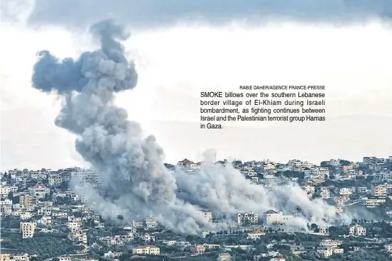  ?? RABIE DAHER/AGENCE FRANCE-PRESSE ?? SMOKE billows over the southern Lebanese border village of El-Khiam during Israeli bombardmen­t, as fighting continues between Israel and the Palestinia­n terrorist group Hamas in Gaza.