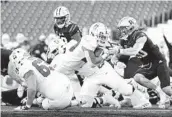  ?? ABBIE PARR GETTY IMAGES ?? Austin Jones scores one of his two touchdowns for Stanford in Saturday’s victory at No. 23 Washington.