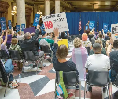  ?? MICHAEL GARD/POST-TRIBUNE ?? Supporters of governor Holcomb’s veto on House Bill 1041 rally at the Indiana Statehouse in Indianapol­is on Tuesday. The veto was overturned by votes held later in the day.