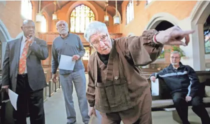  ?? MIKE DE SISTI / MILWAUKEE JOURNAL SENTINEL ?? Tonen O'Connor directs the cast, including Joseph Jackson Jr. (left), a pastor of Friendship Baptist Church in Milwaukee, and the Rev. Dennis Jacobson (second left), retired from Incarnatio­n Lutheran Church in Milwaukee.