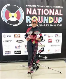  ?? TERI ARREOLA photo ?? Liko Arreola poses with her trophies at the National Field Archery Associatio­n National Roundup last weekend in Yankton, S.D.