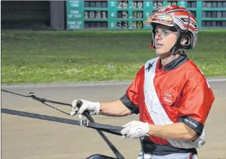  ?? JASON SIMMONDS/JOURNAL PIONEER ?? David Dowling makes his way to the winner’s circle at Red Shores at Summerside Raceway after winning a race in August. Dowling leads all drivers with 25 victories in Summerside during the 2018 meet.