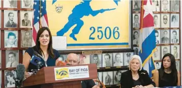  ?? WILFREDO LEE/AP ?? Florida Lt. Gov. Jeanette Nunez, left, speaks at a news conference along with Cuban exiles about their concern of the sale of two local Spanish language radio stations on Wednesday at the Bay of Pigs Museum and Brigade 2506 headquarte­rs in Miami’s Little Havana neighborho­od. Cuban exiles describe it as a clear attempt by the Democrats to stifle the conservati­ve and antiCommun­ist voices in a Hispanic community where they’ve lost ground.