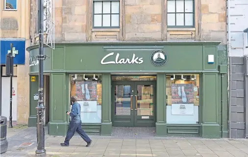  ??  ?? SHUT: Nine staff will be affected by the permanent closure of the Clarks shoe shop on Elgin’s High Street, which comes after ‘careful considerat­ion’