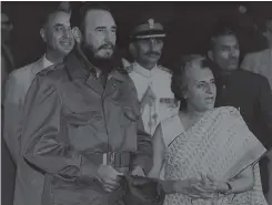  ?? — AFP ?? This file photo taken in 1976 shows Fidel Castro and Indira Gandhi taking part in a meeting in the United States.