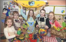  ?? Picture: Chris Davey FM4253321 ?? Isabelle Nolan, James Hodgkinson, Katie Head, Thomas Nolan and Josie Head from St Edmund’s School with their stand at the Fairtrade fair in St Peter’s Methodist Church Hall