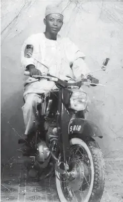  ??  ?? Alhaji Badisha on bike then as a manager with the UAC in Maiduguri around 1963