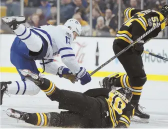  ?? AppHoTo ?? HURTS SOME MORE: Anders Bjork didn't travel with the Bruins to the West Coast after taking a hard hit Saturday night from the Maple Leafs' Matt Martin.