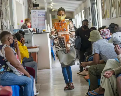  ?? Jerome Delay/Associated Press ?? Volunteers wait to be checked at a vaccine trial facility for AstraZenec­a at Soweto's Chris Sani Baragwanat­h Hospital outside Johannesbu­rg. Americans, Britons and Canadians are getting vaccines, but those in poorer countries will have a long wait because COVAX, the initiative set up to guarantee access, is short of doses.