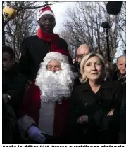  ?? (Photo IP) ?? Après le débat BVA- Presse quotidienn­e régionale, Marine Le Pen s’est offert un bain de foule hier matin au marché de Noël des Champs- Elysées, sous une nuée de caméras.