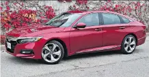  ?? CHRIS BALCERAK/DRIVING ?? The 2018 Honda Accord 1.5T blends a stylish interior with an eye-catching exterior on an excellent chassis.