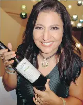  ??  ?? Le Vieux Pin and La Stella co-owner Saeedeh Salem brought wine to a $100,000 benefit for the Neekoo Philanthro­pic Society she founded.