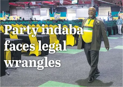  ?? Picture: AFP ?? SURVEYING BATTLEFIEL­D. ANC secretary-general Gwede Mantashe in the main conference hall at the Johannesbu­rg Expo Centre yesterday.