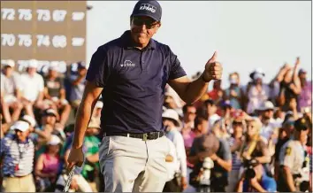  ?? Chris Carlson / Associated Press ?? Phil Mickelson celebrates after winning the final round at the 2021 PGA Championsh­ip in Kiawah Island, S.C. On Friday, Mickelson withdrew from next week’s PGA Championsh­ip. The last PGA champion who didn’t defend his title was Tiger Woods in 2008, as he recovered from reconstruc­tive surgery on his left knee.