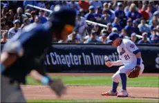  ??  ?? New York Mets third baseman Todd Frazier (21) cannot handle a ground ball hit by Tampa Bay Rays Kevin Kiermaier during the first inning of a baseball game, on Saturday. AP PhoTo/JulIe JAcobson