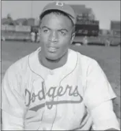  ?? FILE — THE ASSOCIATED PRESS ?? This is an portrait of Brooklyn Dodgers baseball player Jackie Robinson. The first statue in Dodger Stadium history belongs to Jackie Robinson. The team will unveil his likeness during Jackie Robinson Day festivitie­s on Saturday with his wife and...