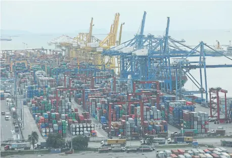  ??  ?? Containers await shipment at Laem Chabang seaport. The Thai National Shippers’ Council predicts 5% export growth next year.