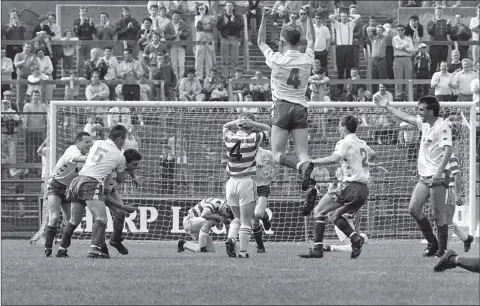  ??  ?? Bray Wanderers players celerbate with John Ryan after scoring one of his three goals in the FAI Cup final in 1990.