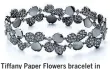  ??  ?? Tiffany Paper Flowers bracelet in platinum with diamonds, $47,400.