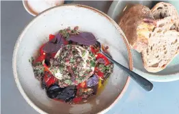  ?? Pictures / Fiona Goodall, Getty Images ?? The burrata with charred cauliflowe­r (above); interior of Amano (top).