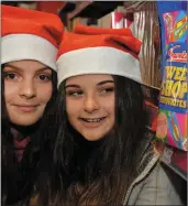  ??  ?? Yasmina Beaujouran and Yoanna Marcheva looking forward to a sweet Christmas in Garvey’s Supervalu, Dingle.