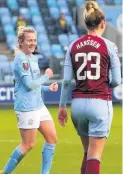  ??  ?? Lauren Hemp celebrates after scoring City’s fourth goal