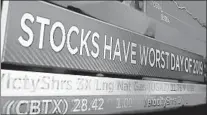  ?? RICHARD DREW/AP ?? NYSE TV screen broadcasts the huge slide by stocks Monday stoked by trade war worries.