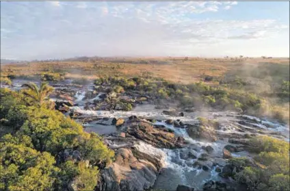  ?? ?? Go with the flow: Many of the rivers in the Southern African region have their origin in the Angolan highlands. Photos: Kostadin Luchansky/angola Image Bank