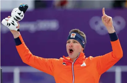  ?? AP ?? Dutch speed skater Sven Kramer raced into the record books on Sunday by winning the gold medal in the men’s 5,000 metres. —