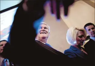  ?? Evan Vucci Associated Press ?? Republican presidenti­al candidate
Newt Gingrich
greets supporters in Ohio at
Bowling Green State University
on Saturday. The former
House speaker is staking his campaign on a big victory Tuesday in his home state of Georgia.