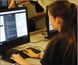  ?? KAYLA BAUGH/THREE RIVERS EDITION ?? Hannah Tauriello, a member of the Girls Who Code club at Cabot High School, works on some coding at a weekly meeting.