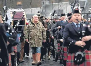  ?? Pictures: Steve MacDougall/PA. ?? There was a festive mood in Kenmore as anglers gathered for the opening day of the salmon season on the River Tay.