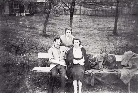  ?? WARREN COMMISSION ARCHIVES ?? Lee Harvey Oswald, his wife Marina, and Marina’s aunt, Lobova Aksionova, in Minsk, U.S.S.R. The 20-year-old Marine defected to the Soviet Union soon after he was discharged in 1959, and worked at a factory until returning to the United States in 1962.