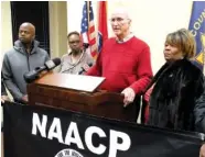  ?? STAFF PHOTO BY TIM BARBER ?? Hamilton County Sherriff Jim Hammond speaks about the recent video showing a white deputy punching and kicking a handcuffed black man during an arrest. From left are Commission­er Warren Mackey, Councilwom­an Demetrus Coonrod, Hammond and Elenora Woods.