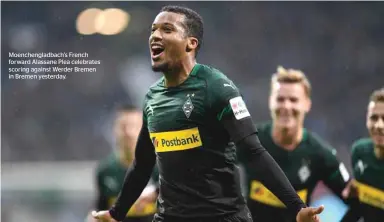  ??  ?? Moenchengl­adbach’s French forward Alassane Plea celebrates scoring against Werder Bremen in Bremen yesterday.