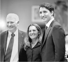  ??  ?? Chrystia Freeland poses with Canada’s Governor General David Johnston (left) and Prime Minister Justin Trudeau after being sworn-in as Canada’s foreign affairs minister during a cabinet shuffle at Rideau Hall in Ottawa, Ontario, Canada. — Reuters photo