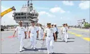  ?? PTI ?? Navy personnel while taking delivery of the Indigenous Aircraft Carrier Vikrant from Cochin Shipyard Limited, Kochi