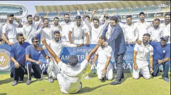  ?? PTI ?? Victorious Saurashtra players after winning the Ranji Trophy final against Bengal in Rajkot on Friday.