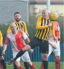  ?? ?? Whitburn Over-40s (yellow/black) taking on Hall Farm.