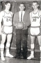  ?? COURTESY PHOTO ?? Warren Mitchell, coach of the 1963-64 Newport News High state basketball champions, is shown with team captains Chris Ellis, left, and Billy Taylor.