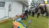  ?? PORTSMOUTH POLICE ?? A still frame from a video recorded by a Portsmouth police officer’s body camera shows other officers approach an armed burglary suspect as he lays in the backyard of a home on Cherokee Road. Officer Jeremy Durocher shot 18-year-old Deontrace Ward in the back as he ran away.